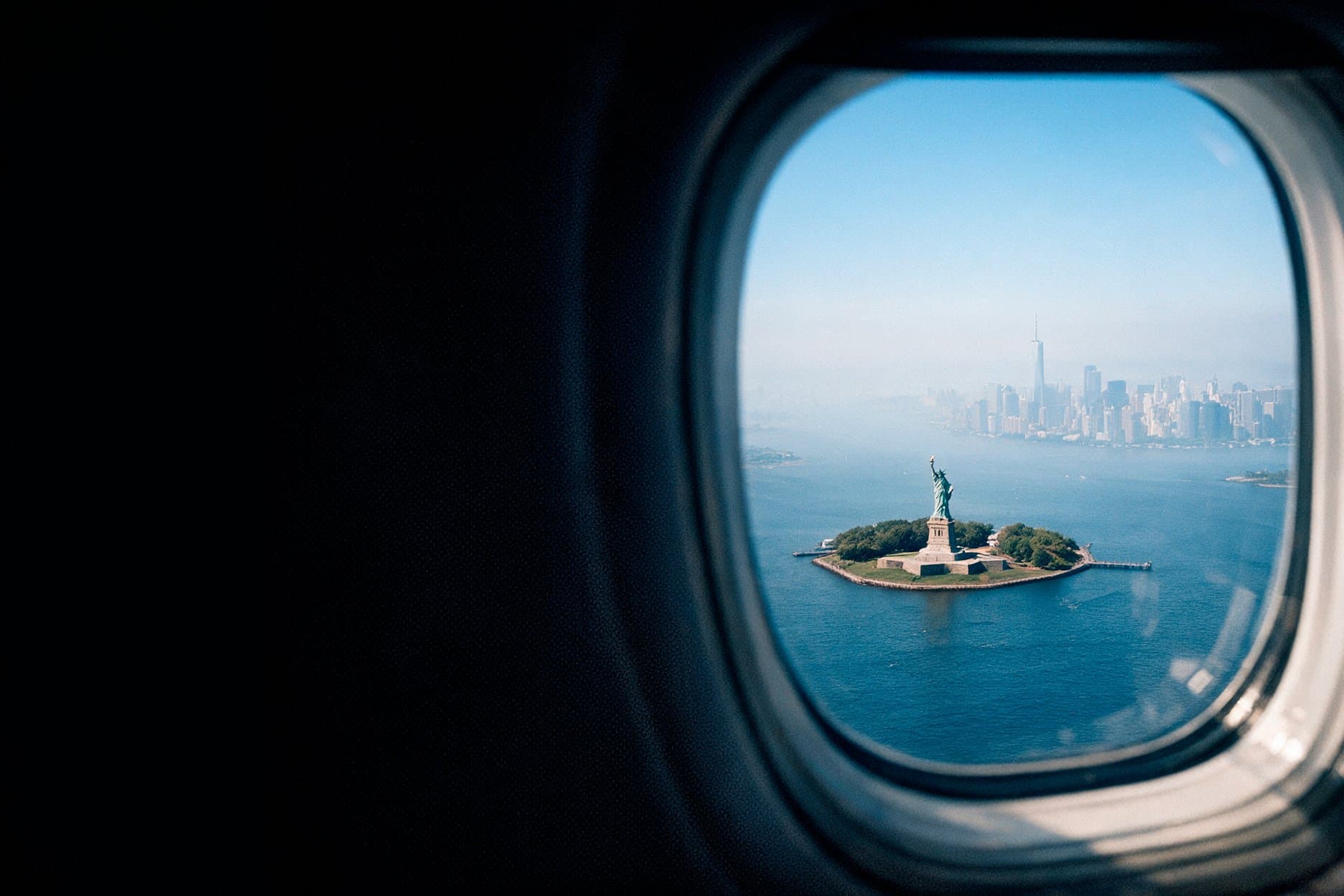 View of the Statue of Liberty from an airplane window